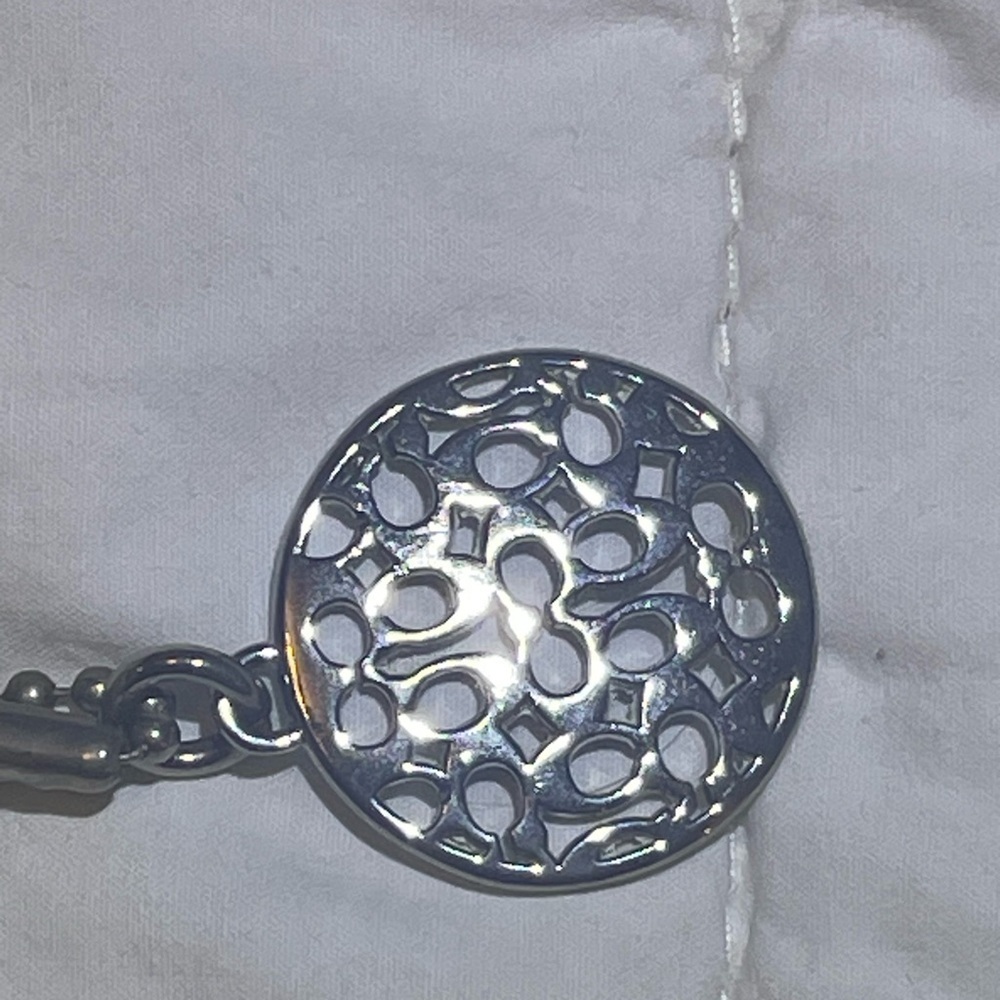 Cream Coach bag with rare OP Art silver nickel metal bag charm hang tag. - Picture 8 of 13